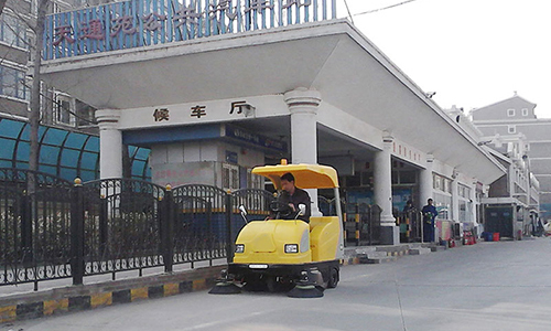 Our Sweeping Machine Works At The Bus Stop